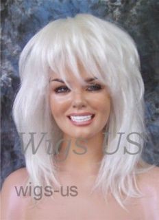 Tina Turner style Shoulder Length costume wig Available in Pale Blonde