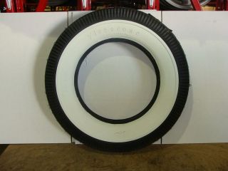NEW FIRESTONE DELUXE CHAMPION WIDE WHITE WALL TIRE, TIRE IS 6.00 16 