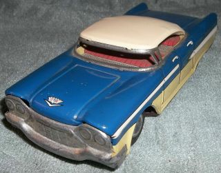   vintage 1957 58? Plymouth Fury or ? metal tin toy friction car Japan