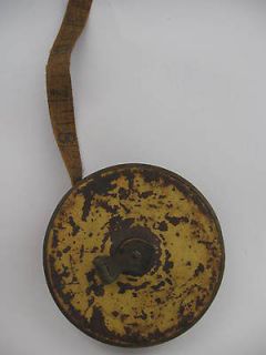 antique vintage tin metal worn measuring tape cloth measure primitive