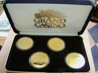   GRAND CASINO GOLD PLATED BRONZE GULF COAST SERIES COLLECTOR COIN SET