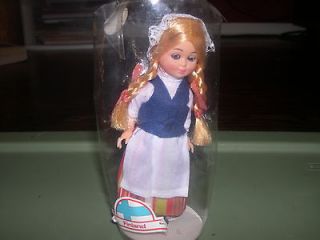 Mini dolls by country  Finland, Ireland and 3 others