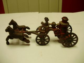 CAST IRON TOY   HORSE DRAWN FIRE PUMPER WITH DRIVER