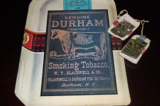 EARLY DURHAM TOBACCO   AD SIGN, UNOPENED TOBACCO POUCH AND 2ND USED 