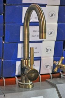 antique brass bathroom faucet in Faucets