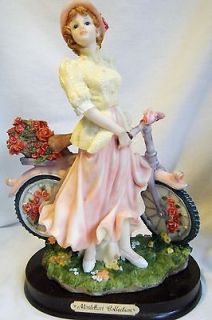   Collection 1900s Girl on Bike w/Baskets of Flowers Italian Design
