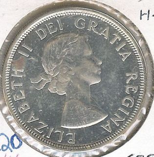 1964 CANADIAN SILVER DOLLAR IN MS 65 CONDITION HEAVY CAMEO RARE # 