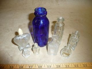   of glass bottles clear blue cobalt perfume medicine emerson rug old