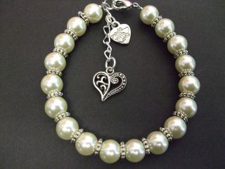 Sumptious Antique Looking Ivory Pearl Bracelet. Change Charm to 