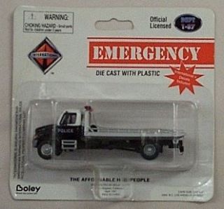   87 Die Cast Intl Police Black & White Roll Off On Flatbed Tow Truck