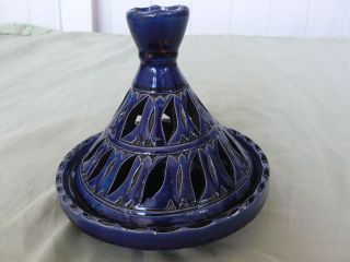   tajine style ceramic oil burner   designs cut out of the clay