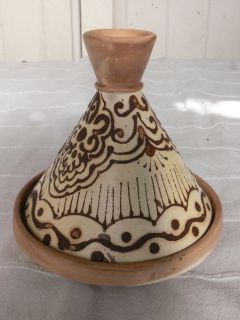 Moroccan handmade pottery tajine   design painted on with henna.