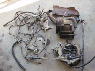 Newly listed 1975 Dodge 318 smog parts and carb, air pump