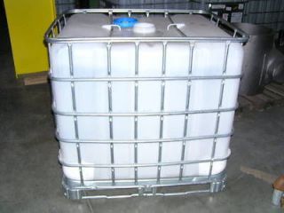 TOTE PLASTIC WITH METAL FRAME 275 GALLON LIQUID STORAGE CONTAINER 
