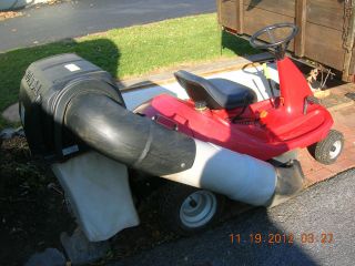 Newly listed honda riding mower with dual bagger