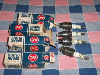 New Spark Plugs (Package Damage) Four AC 44S 2 Have Metal Ring 2 Don 