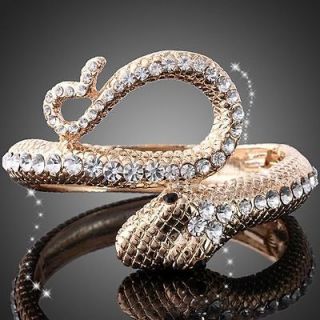 Newly listed ARINNA cool snake black eyes gold plated Bangle Bracelet 