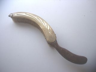   RAISED RELIEF PATTERN ON BRASS TABLE CRUMB BRUSH WITH WOODEN HANDLE