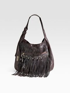 Grommets, studs and rock and roll fringe take a soft leather style 