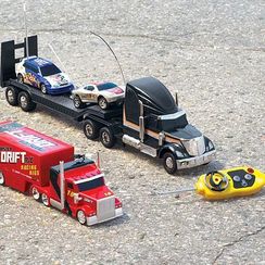 Radio Controlled Goldlok Jumbo Hauler With 2  Racers For Land