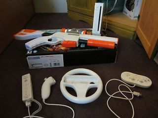 Wii w/ 13 games, 5 gamecube games + remotes