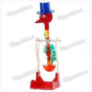 new novelty glass drinking dipping dippy bird toy red from