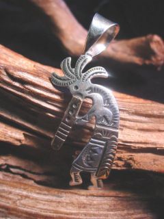 DEAD PAWN STERLING SILVER AND 14KT GOLD KOKOPELLI PENDENT