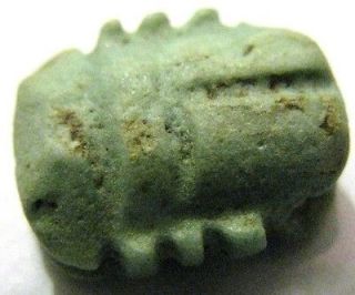 egyptian faience button in a shape of a beatle archaeology