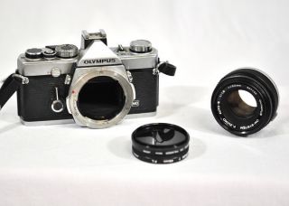   OM 1 35mm SLR Film Camera 50mm Lens Promaster Tiffen Polarized Filters