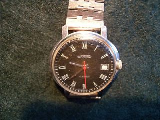 Russian Wristwatch Wostok works well wind up cheap price.