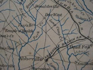 The map shows wagon roads, ferry crossings, towns, settlements 