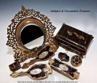 All items and photos are the express property of Antiques & Uncommon 