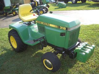 1991 John Deere 318 garden tractor w 3PT weights and 26 bar tires