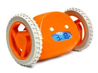 closeup of clocky s snooze button speaker and clock alarm setting 