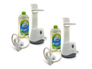 automatic toilet bowl cleaner with solution bottle in place