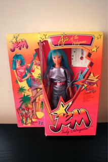 up for auction is a boxed jem doll mib of 1st edition aja