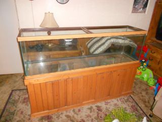 125 gallon aquarium fish tank and pine cabinet stand with storage