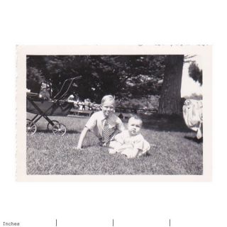 Old Photo Boy and Baby in Park by Stroller Carriage Pram