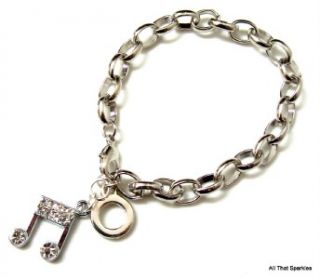 Silver plated 16cm belcher bracelet with a clear crystal music note 