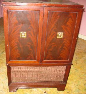 Vintage antique television in wood case with mahogany wood ???