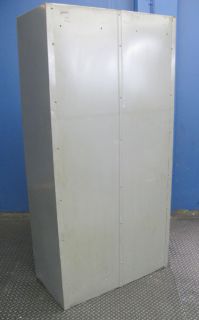   is a used Heavy Duty Bi Fold 2 Door Storage Cabinet in good condition