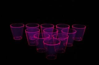 50 Count Neon Pink Blacklight Reactive Plastic Shot Glasses
