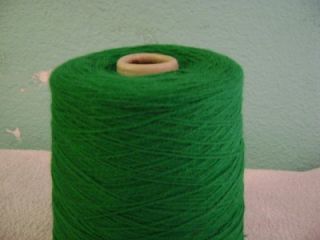 UP FOR AUCTION IS A BRAMWELL DUO SPUN EMERALD GREEN YARN CONE. THE 