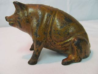 antique cast metal sitting piggy bank  58