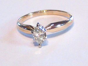 Solid 14kt Gold Marquise .23 Carat Diamond Ring, Good Buy