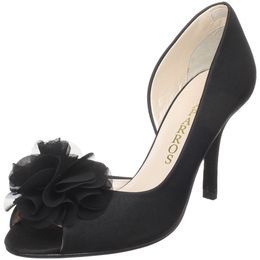 This elegant evening pump is by Caparros in a size 6.5. New in box, it 