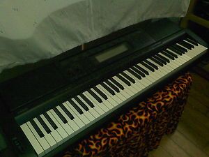 Casio WK 500 76 Key Keyboard With Power Supply And Foot Pedal