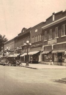 RPPC 1940s Central City NE Main Street Postcard Storefronts Old Cars 
