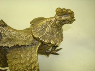 pair of brass roosters cocks