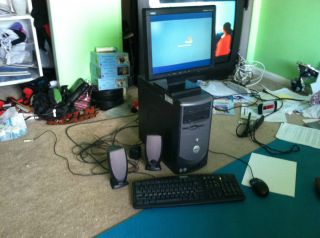 Dell computer with NEC monitor, speakers, keyboard, and mouse